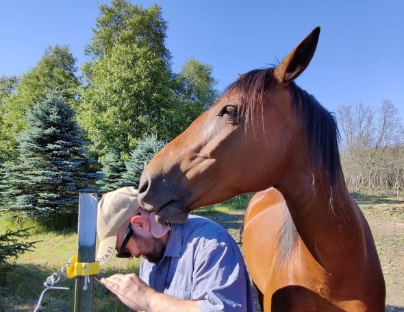 Primo making sure Nick stays cool in the summer sun!
